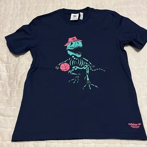 Adidas Originals dinosaur tee shirt.